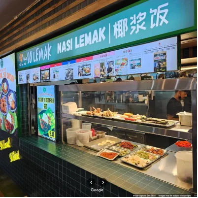 Image Shanice Lim Michelin-Trained Chef Serving Nasi Lemak at a Hawker Centre 