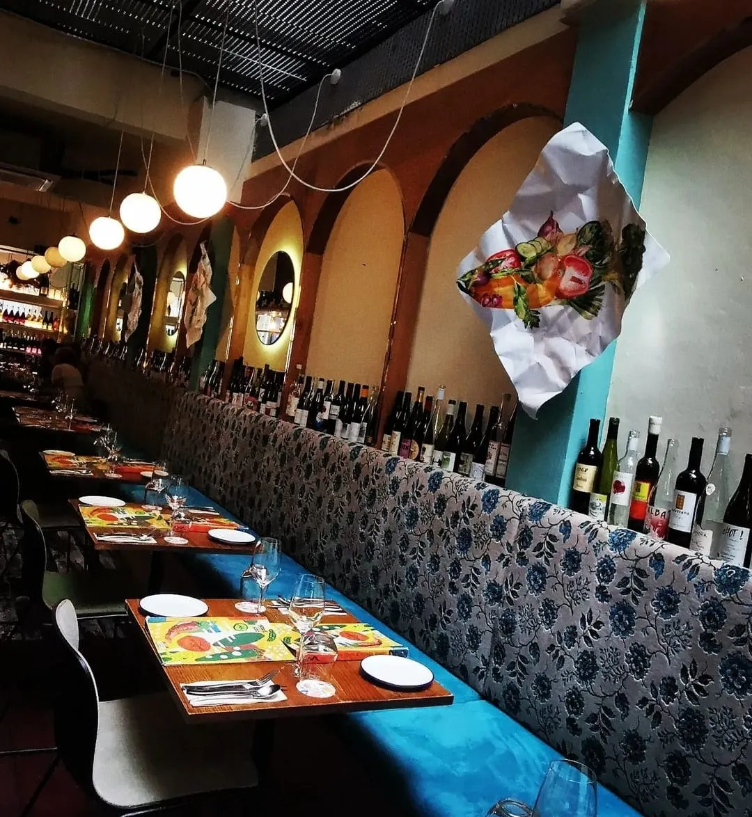 Image A vibrant, gluten-free café and natural wine bar in Tiong Bahru, serving creative Latin-Mediterranean plates in a cozy, rustic-chic setting